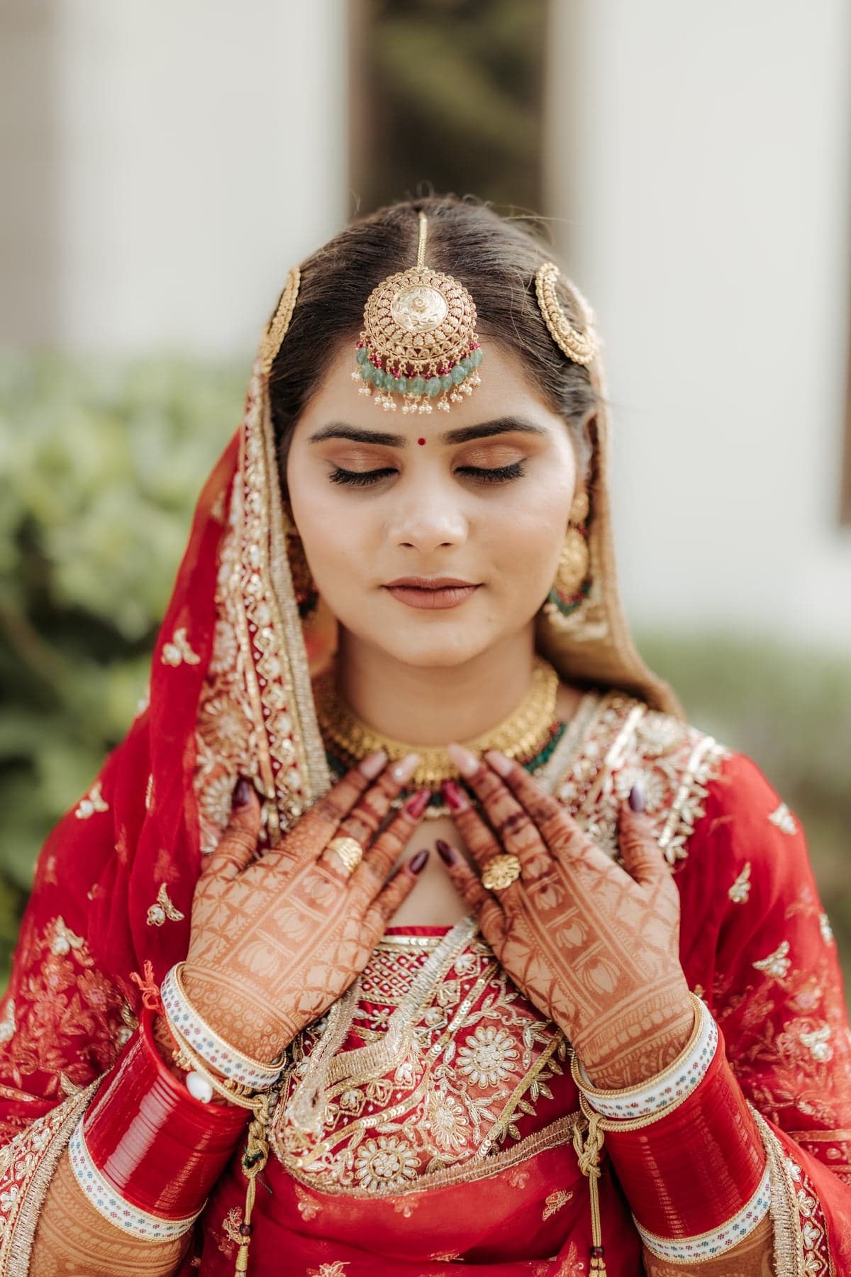 A finished, carefully composed bridal portrait